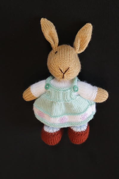 Hand Knitted Girl Rabbit wearing a Green Dress