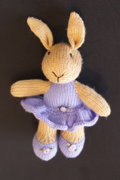 Hand Knitted Girl Rabbit wearing Lilac Flower 