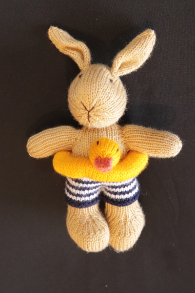 Hand Knitted Boy Rabbit wearing Trunks and Ducky Ring